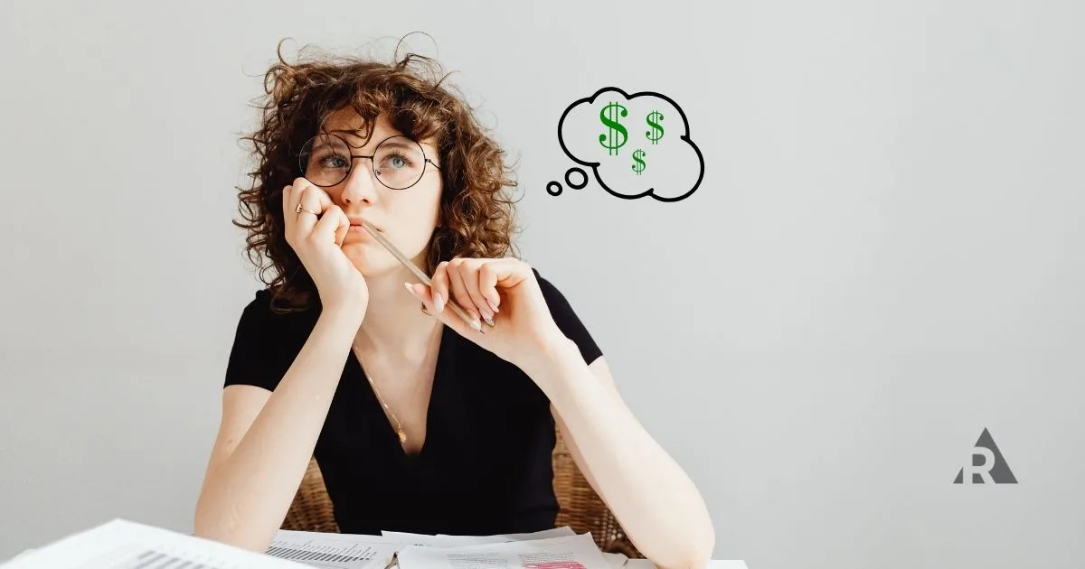 women thinking with money signs