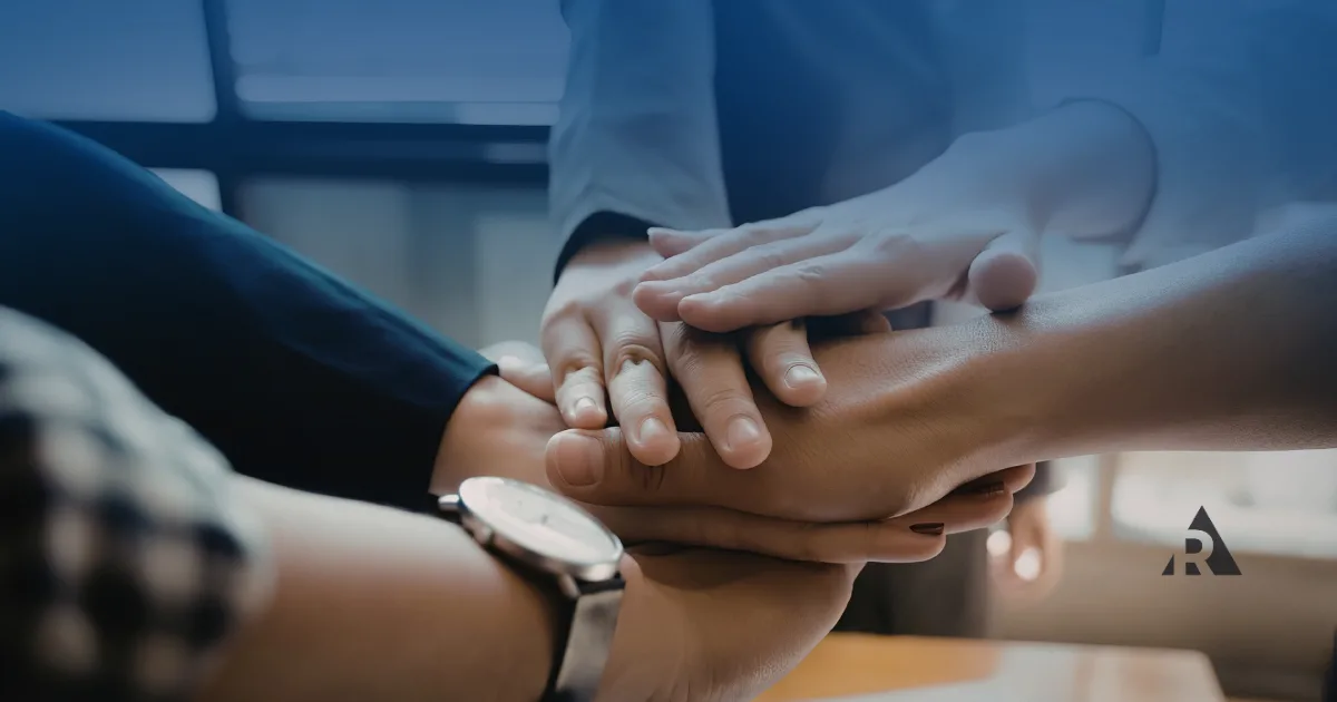 Hands together representing team work