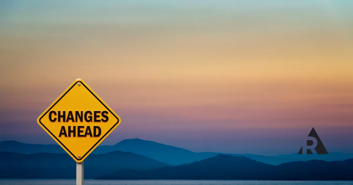 Road sign reading “Changes Ahead” against a mountain landscape at sunrise, symbolizing how organizations successfully adapt and respond to change