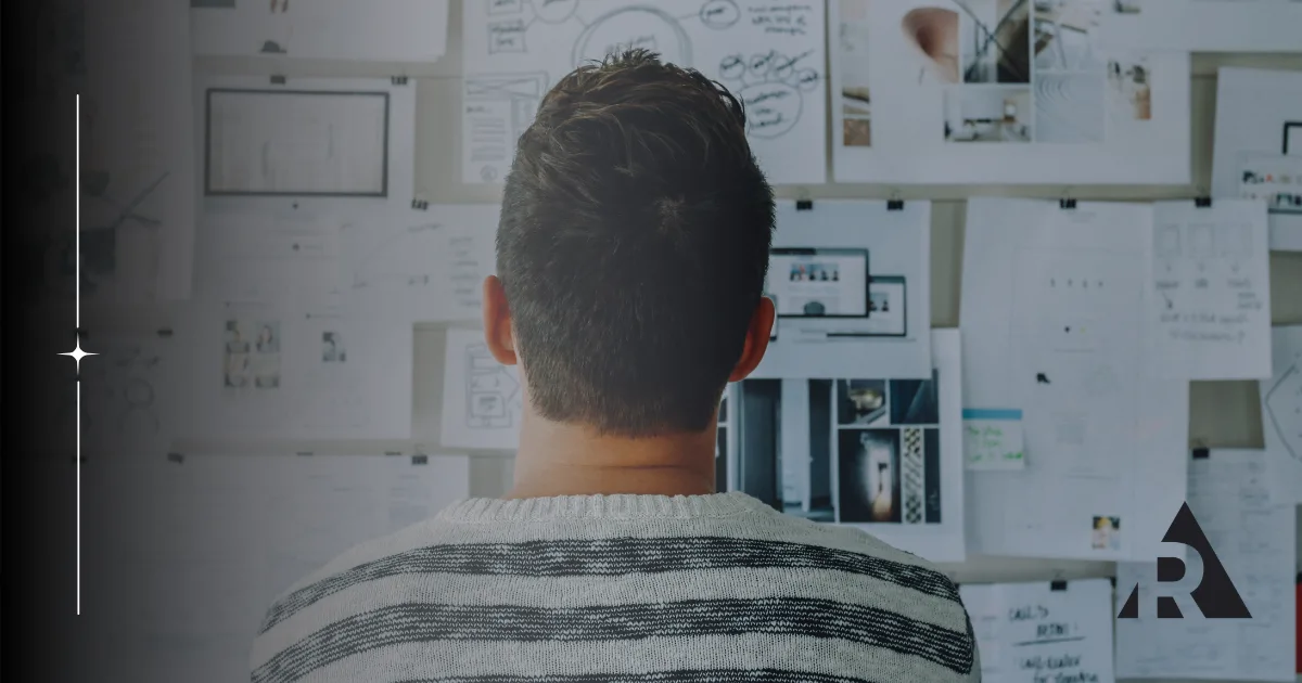 Man looking at Scrum Board