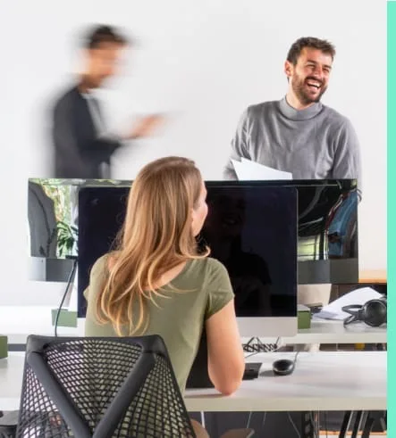 man laughing at desk product owner training