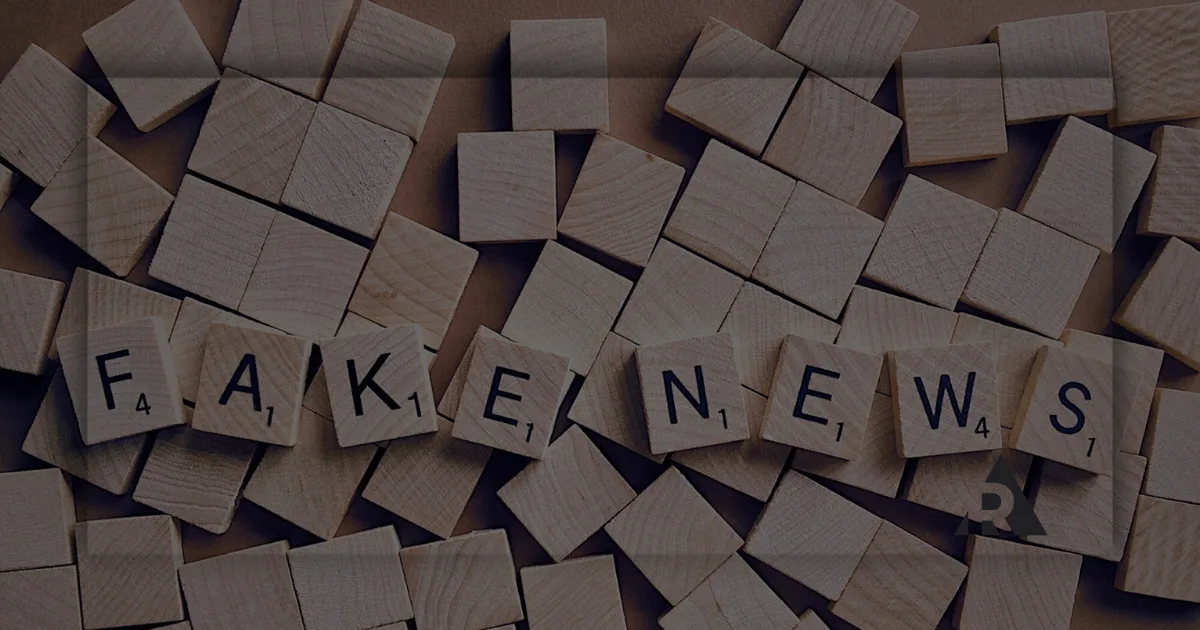 Scrabble pieces that say "FAKE SCRUM"
